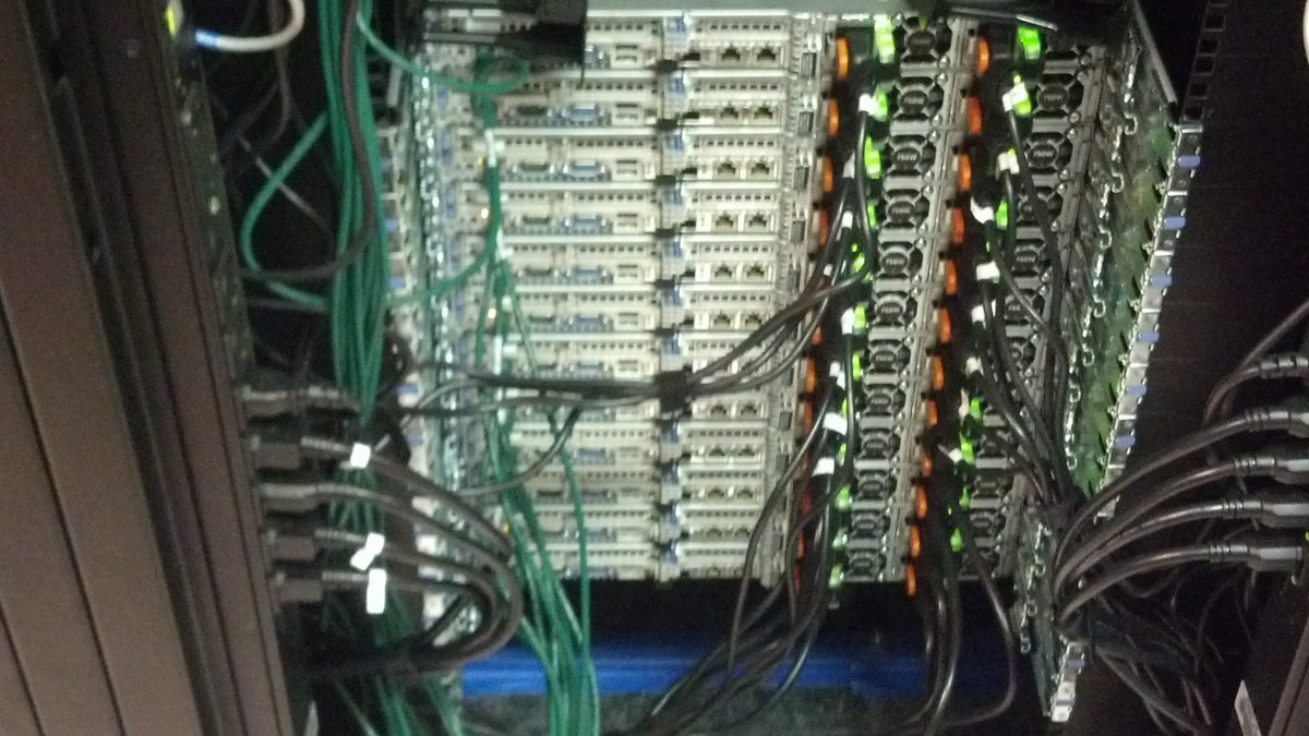 Server racks and cables inside Wikimedia’s ULSFO caching facility.